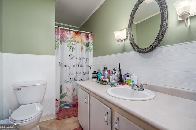 bathroom with vanity, toilet, crown molding, and walk in shower