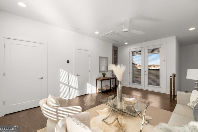 living room featuring french doors, dark hardwood / wood-style flooring, and ceiling fan