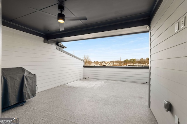 view of patio featuring ceiling fan and a grill