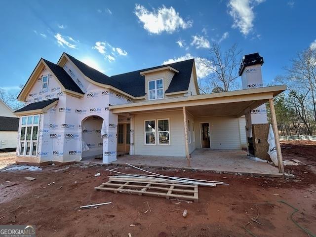 view of front of house with a carport