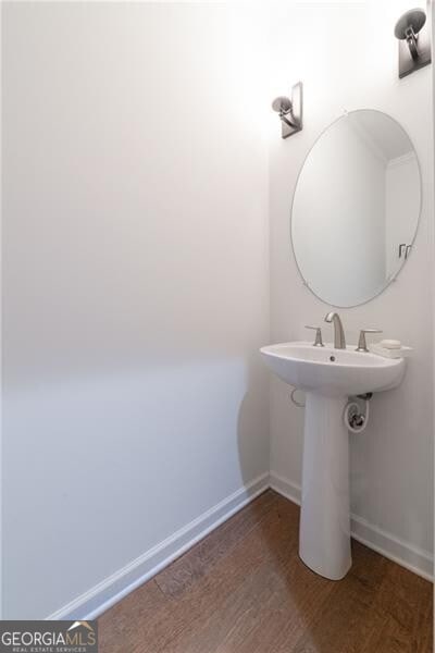 bathroom featuring hardwood / wood-style flooring