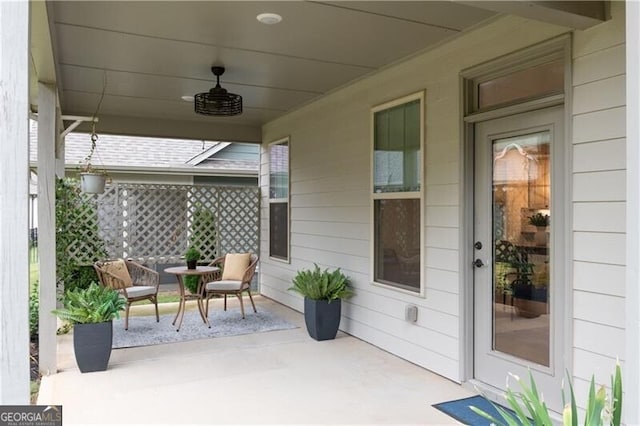 view of patio / terrace featuring ceiling fan and a porch