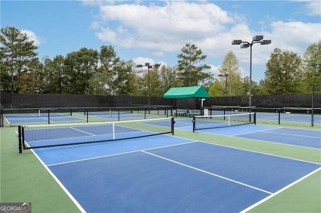 view of tennis court with basketball court