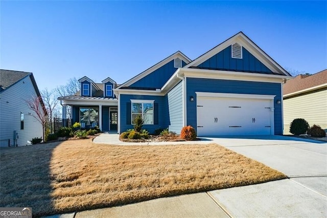 view of front of house with a front lawn and a garage