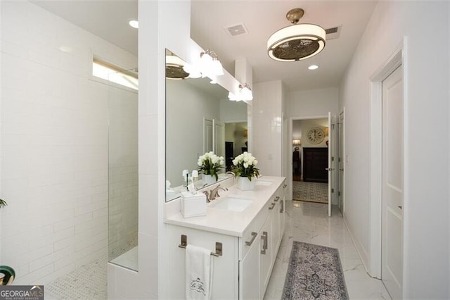 bathroom with vanity and walk in shower