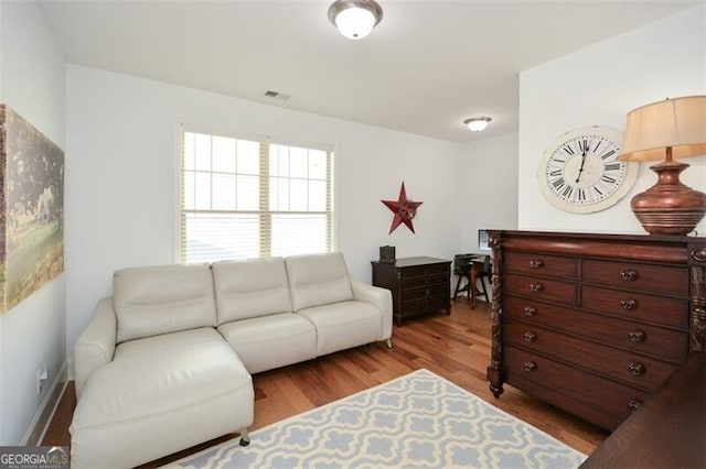 living room featuring light wood-type flooring