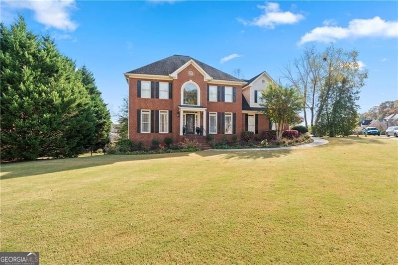 view of front of house with a front yard