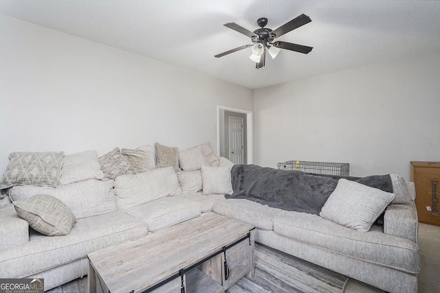 living room featuring ceiling fan