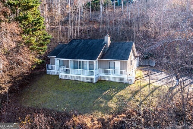 3160 Hiawassee Trce, Hiawassee, GA 30546 - rear view of house with a lawn