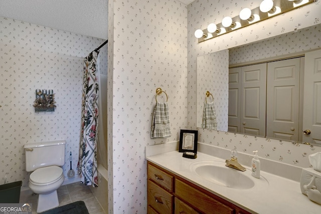 full bathroom with vanity, tile patterned flooring, toilet, shower / bathtub combination with curtain, and a textured ceiling