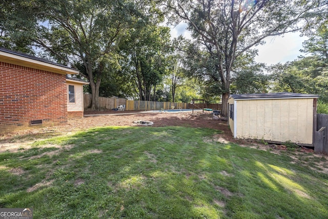 view of yard with a shed