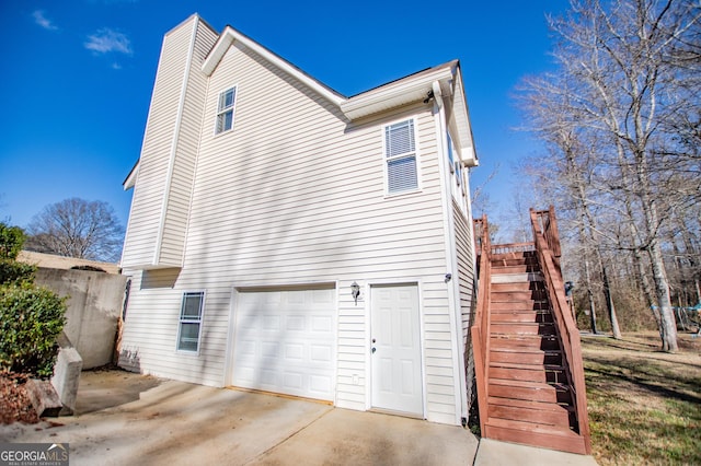 view of home's exterior with a garage