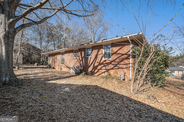 back of property with central air condition unit