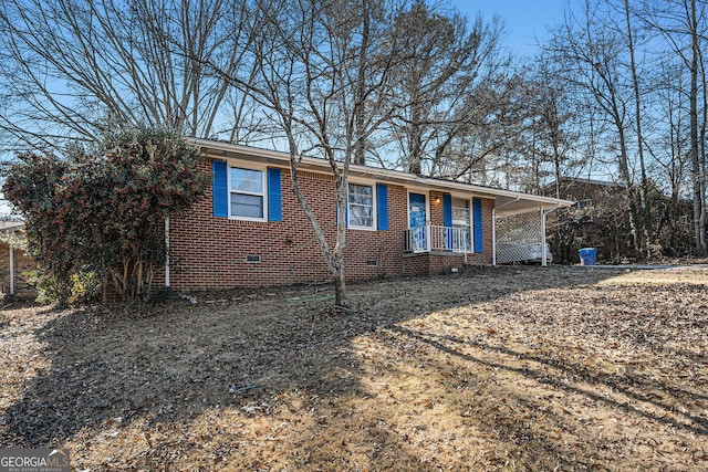 ranch-style home with covered porch