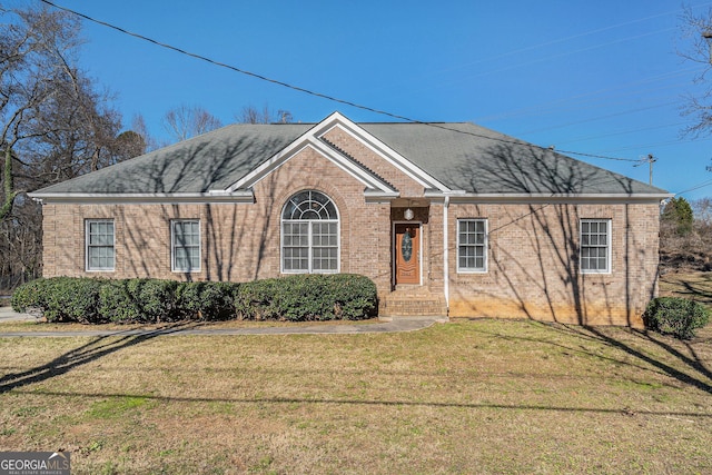 view of property featuring a front yard