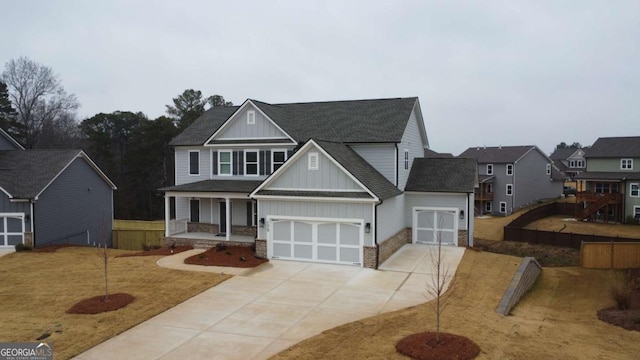 view of front of property with a garage and covered porch