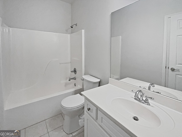 full bathroom with tile patterned floors, vanity, shower / bathtub combination, and toilet