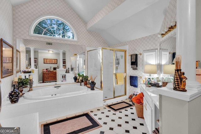 bathroom with high vaulted ceiling, vanity, and independent shower and bath