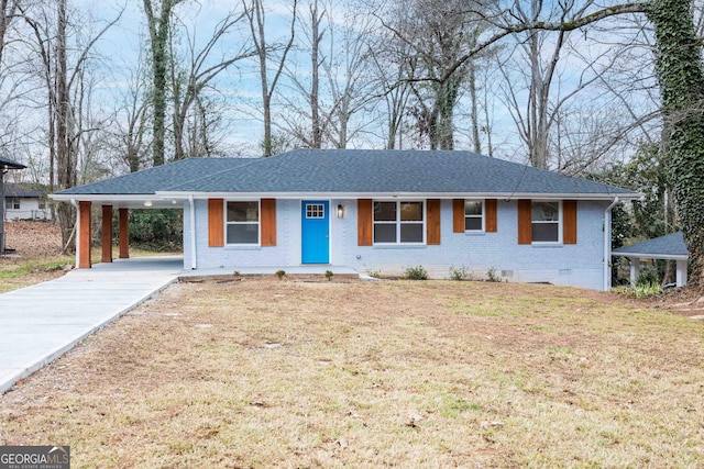 ranch-style house with a front yard, a porch, and a carport