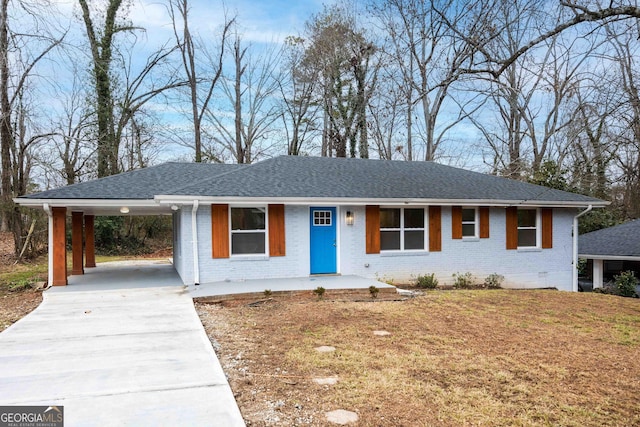 view of front of home with a carport