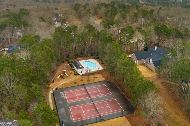 4492 Bryten Dr, Douglasville, GA 30135 - aerial view of a forest and a pool area