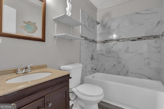 full bathroom featuring vanity, toilet, and tiled shower / bath combo