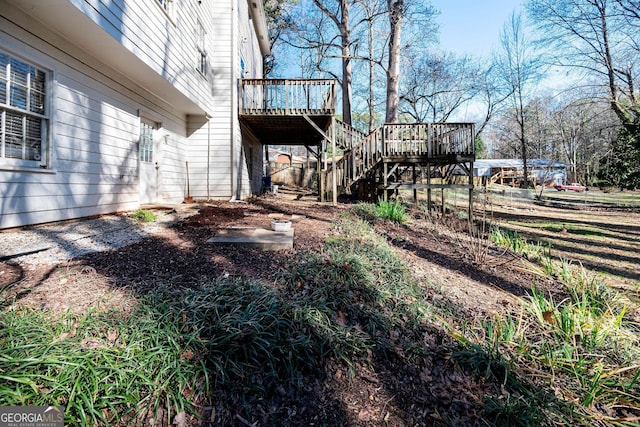 view of yard with a deck