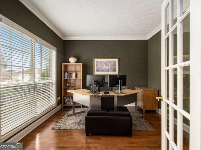 office area with french doors, a textured ceiling, crown molding, and dark wood-type flooring