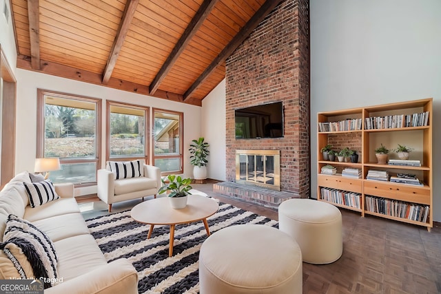 living room with high vaulted ceiling, beamed ceiling, wood ceiling, and a fireplace