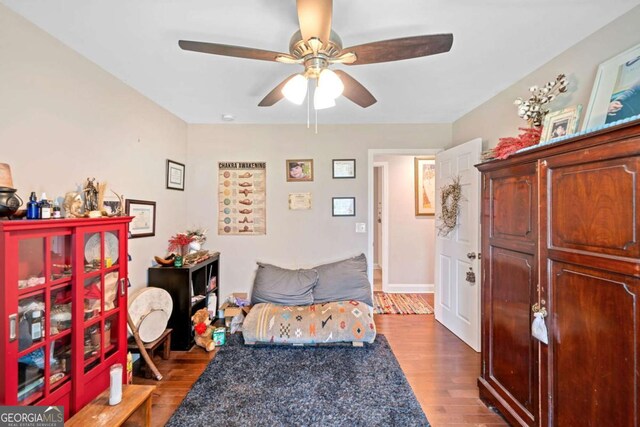 bedroom featuring light hardwood / wood-style flooring and ceiling fan