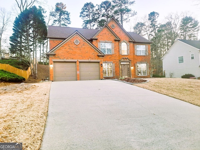 view of front of property with a garage