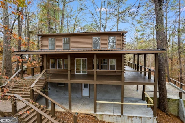 rear view of house with a deck