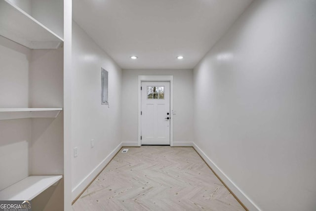 doorway featuring light parquet floors