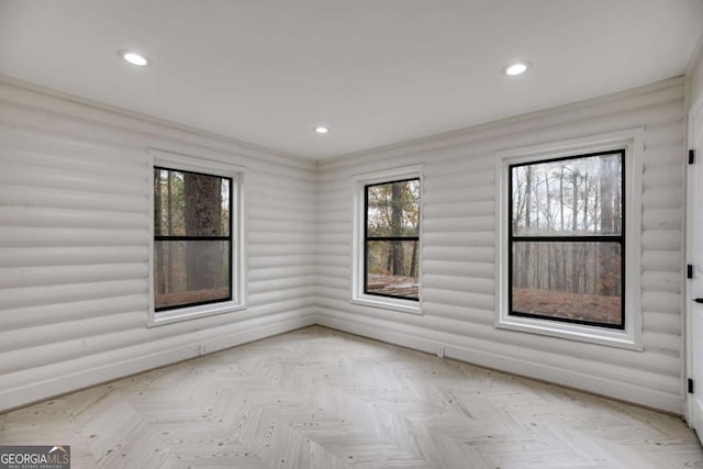 empty room featuring light parquet flooring