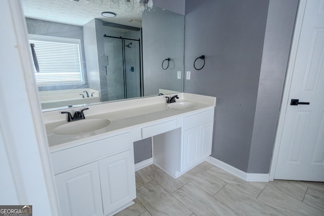 bathroom featuring vanity and separate shower and tub