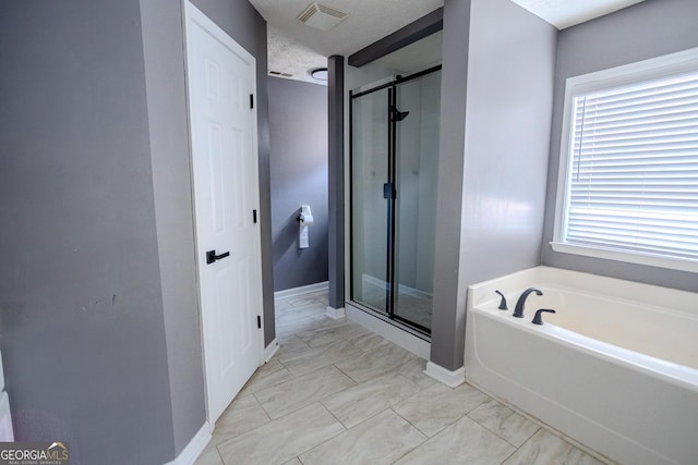 bathroom featuring plus walk in shower