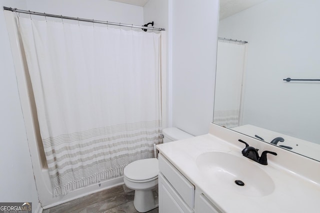 full bathroom featuring a textured ceiling, vanity, toilet, and shower / bath combo with shower curtain