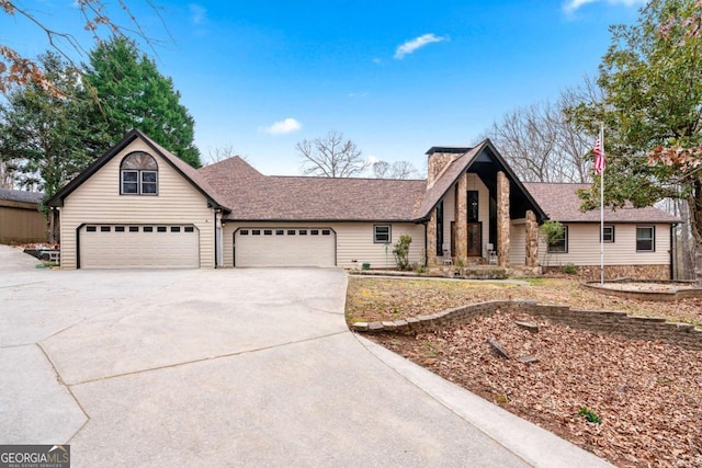 view of front of home with a garage