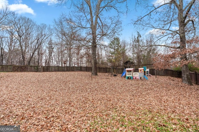 view of yard featuring a playground