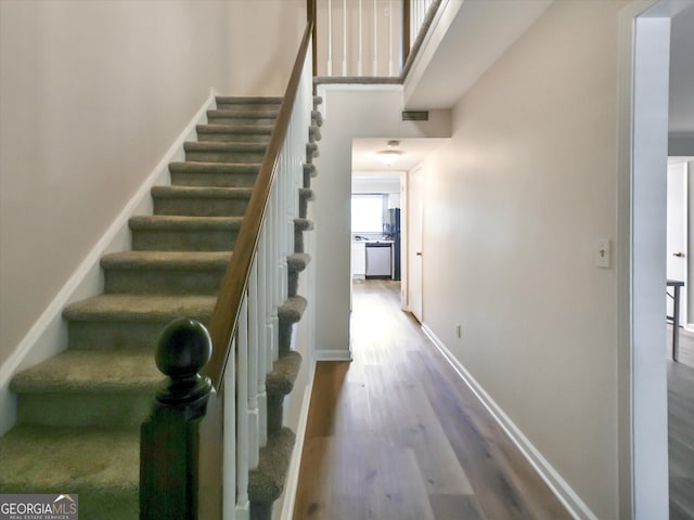 6520 Roswell Rd Unit 59, Sandy Springs, GA 30328 - stairs with wood finished floors and a towering ceiling