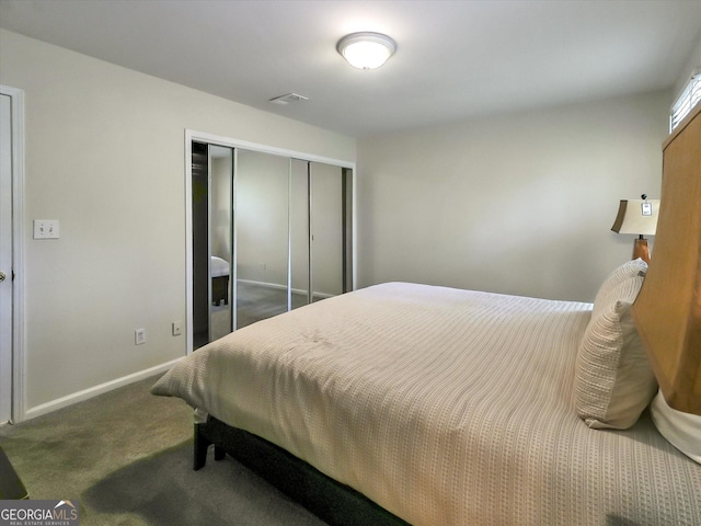 6520 Roswell Rd Unit 59, Sandy Springs, GA 30328 - carpeted bedroom featuring a closet and baseboards
