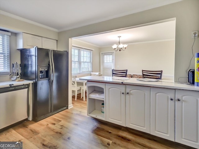 6520 Roswell Rd Unit 59, Sandy Springs, GA 30328 - kitchen with black refrigerator with ice dispenser, dishwasher, ornamental molding, white cabinetry, and a chandelier