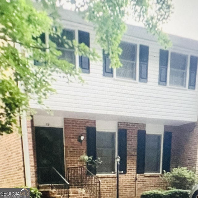 6520 Roswell Rd Unit 59, Sandy Springs, GA 30328 - view of front of home with brick siding