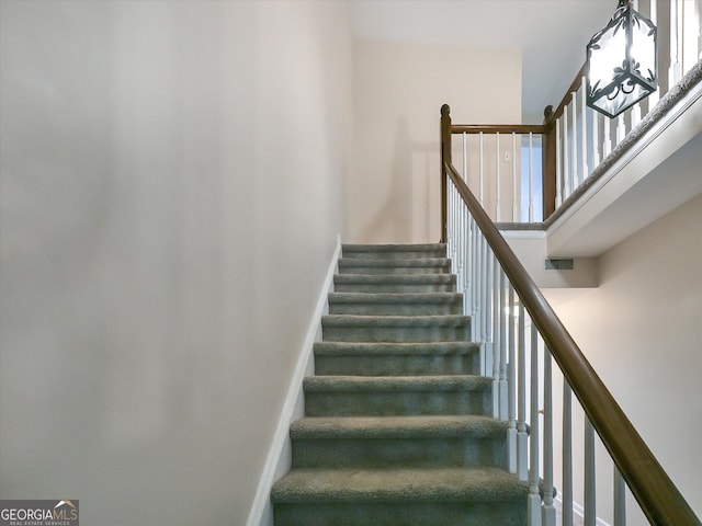 6520 Roswell Rd Unit 59, Sandy Springs, GA 30328 - stairs with a high ceiling