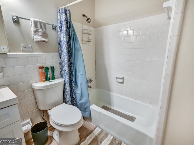 6520 Roswell Rd Unit 59, Sandy Springs, GA 30328 - full bathroom featuring shower / bath combo, vanity, tile walls, and a wainscoted wall