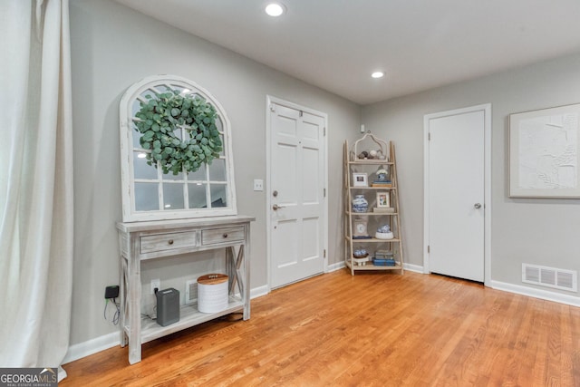 foyer with light hardwood / wood-style flooring