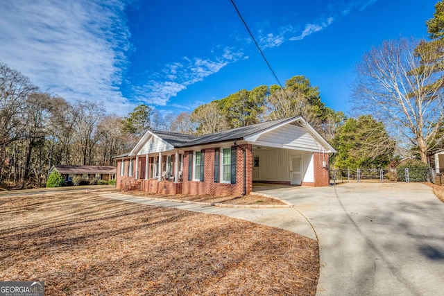 view of property exterior featuring a carport