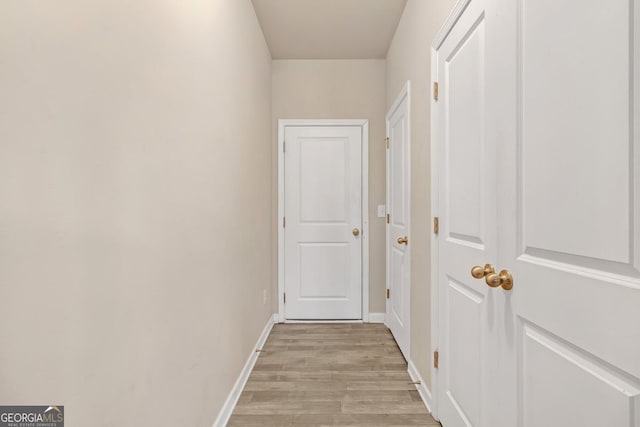 hall featuring light hardwood / wood-style floors