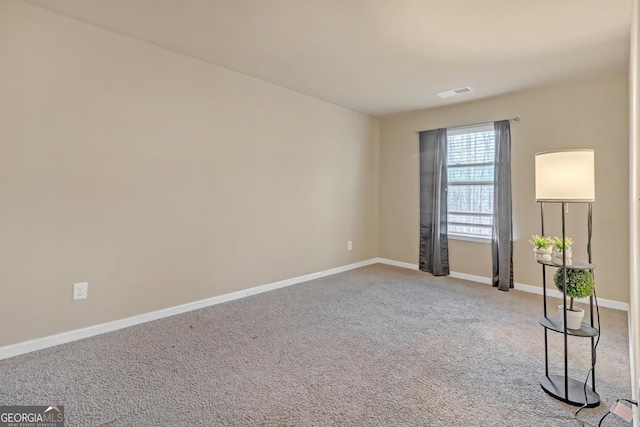 unfurnished room with carpet