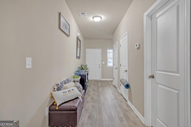 hall featuring light hardwood / wood-style flooring